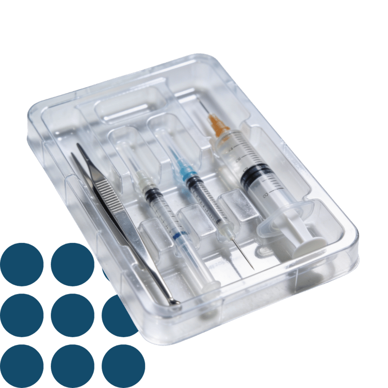 Clear thermoformed plastic tray holding medical instruments