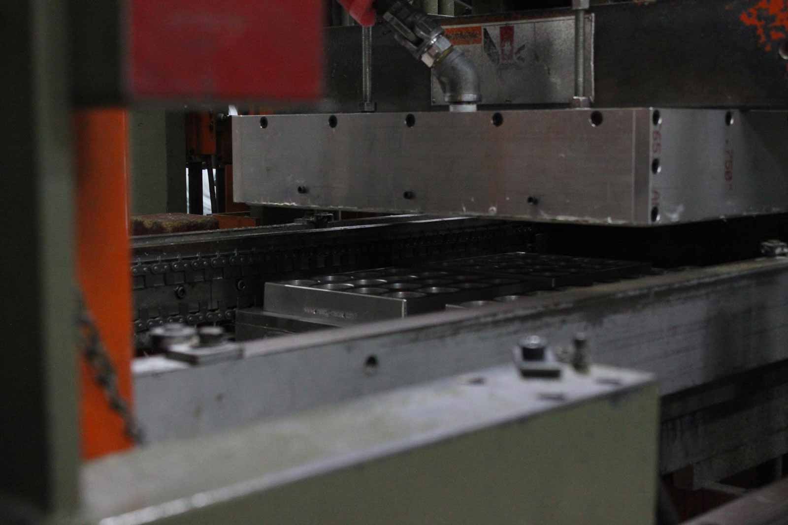 Industrial stamping press equipment for custom packaging tray production